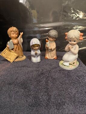 Collection of vintage Homco and Enesco figurines